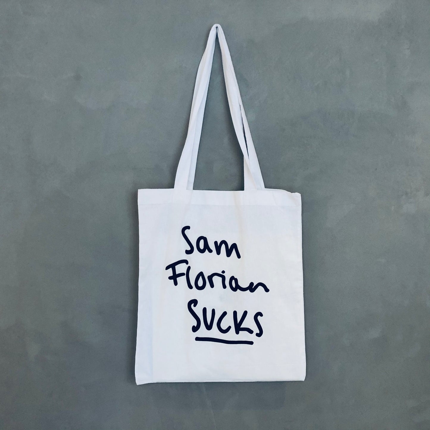 Sam Florian Sucks Tote bag